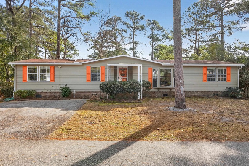 Welcome to this spacious 4-bedroom, 2-bath manufactured home - Beach Home for sale in Murrells Inlet, South Carolina on Beachhouse.com