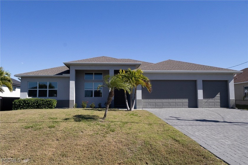 Practically NEW and beautifully upgraded, this 4-year-old Cape - Beach Home for sale in Cape Coral, Florida on Beachhouse.com