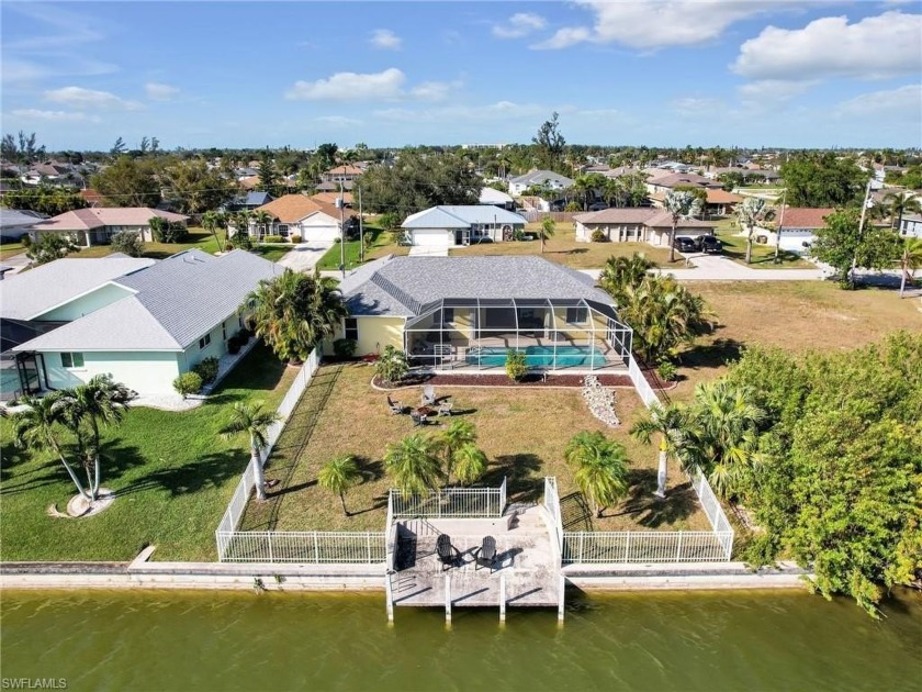 Welcome to this well-appointed pool home situated on a - Beach Home for sale in Cape Coral, Florida on Beachhouse.com