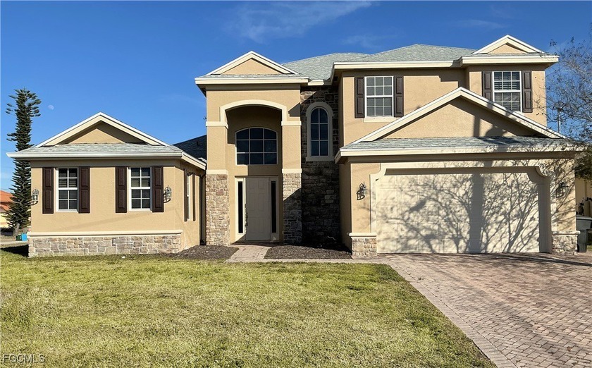 Beautiful huge two story home in north Cape Coral. Why wait to - Beach Home for sale in Cape Coral, Florida on Beachhouse.com