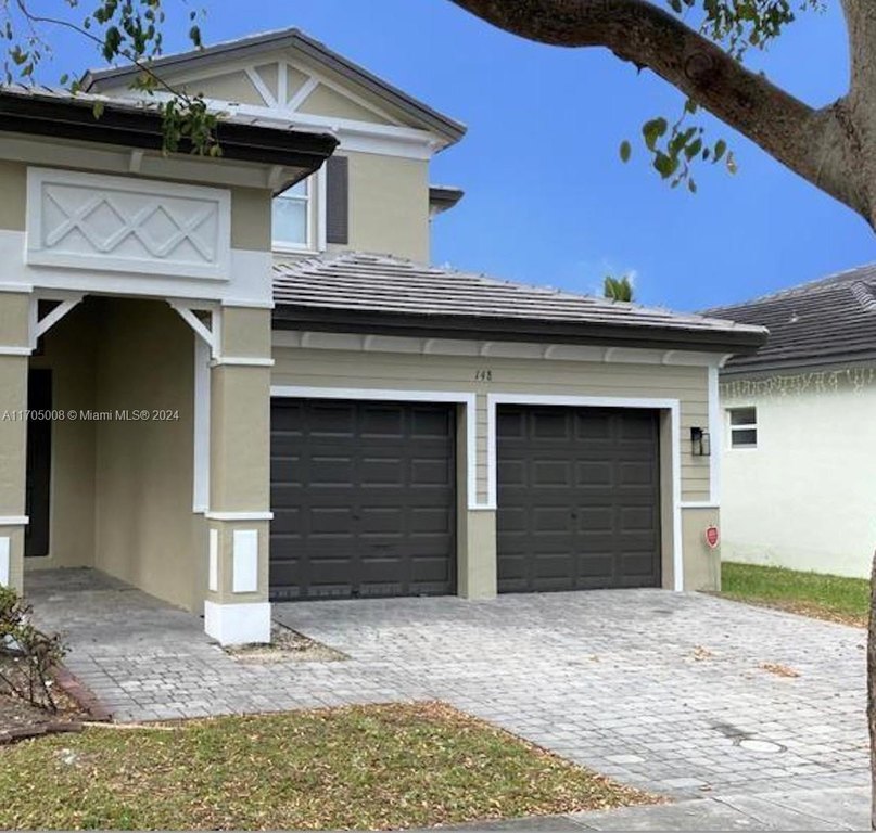 Tastefully updated two-story lakefront home inside this - Beach Home for sale in Homestead, Florida on Beachhouse.com