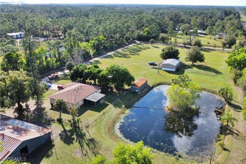 Welcome to your own private oasis on this stunning 5-acre - Beach Home for sale in North Fort Myers, Florida on Beachhouse.com