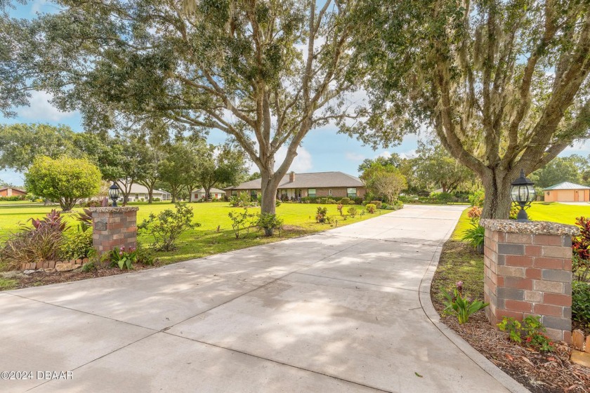 Impeccably maintained brick residence on 2.5 acres. Feel storm - Beach Home for sale in Port Orange, Florida on Beachhouse.com