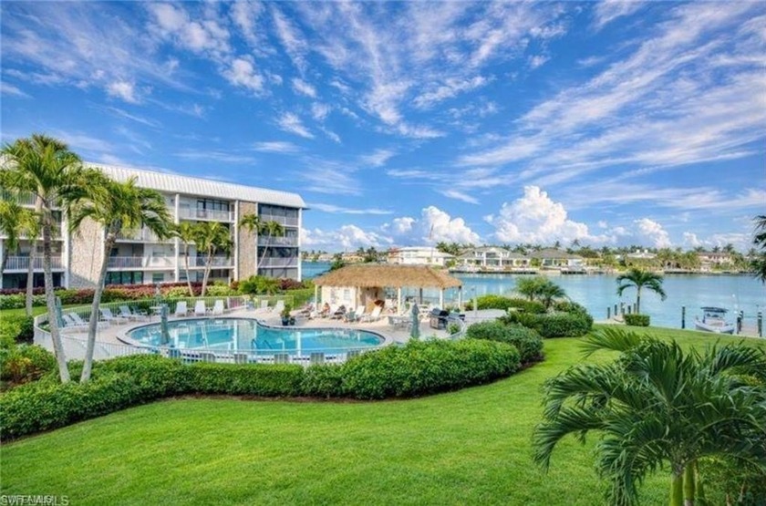 Experience the ultimate Naples waterfront lifestyle in this - Beach Condo for sale in Naples, Florida on Beachhouse.com