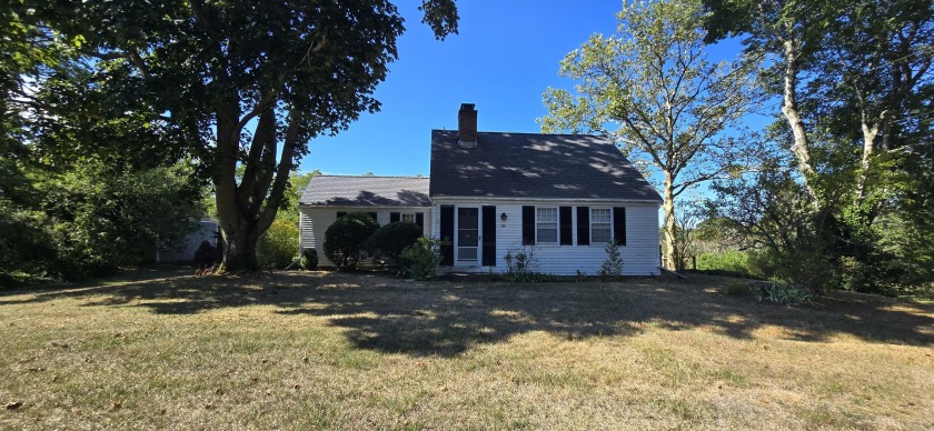 Perched on the marsh of Rock Harbor Creek, this classic Cape Cod - Beach Home for sale in Orleans, Massachusetts on Beachhouse.com