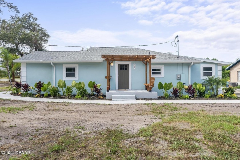 Beautifully renovated home on an oversized corner lot situated - Beach Home for sale in Ormond Beach, Florida on Beachhouse.com