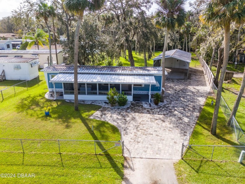 Welcome to New Smyrna Beach!  This 2-bedroom, 1-bathroom home is - Beach Home for sale in New Smyrna Beach, Florida on Beachhouse.com