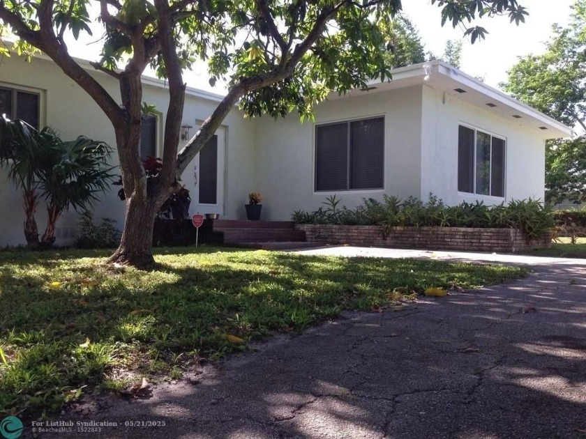 This charismatic mid century home sits on a massive 1/4 acre lot - Beach Home for sale in Oakland Park, Florida on Beachhouse.com