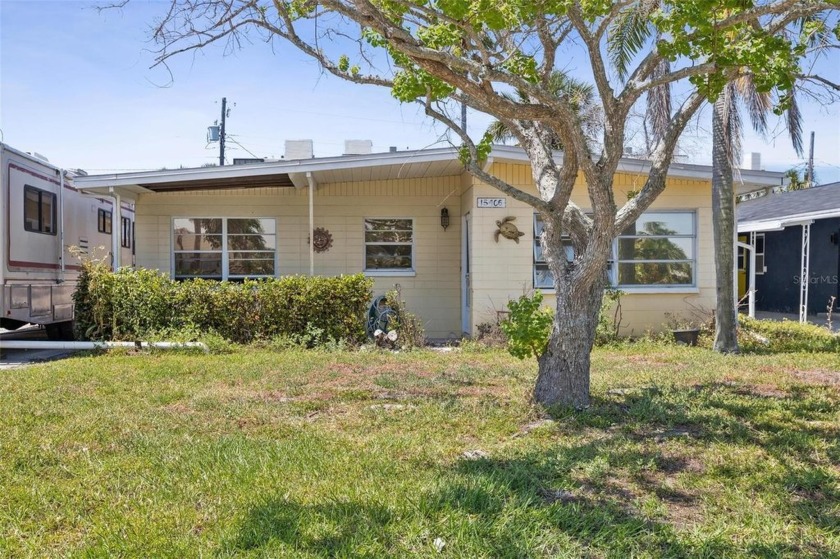 Steps to the sand - endless potential awaits! This charming 2 - Beach Home for sale in Madeira Beach, Florida on Beachhouse.com