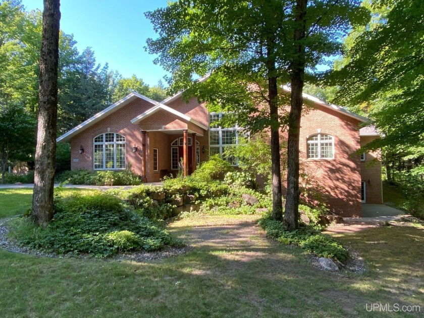 This executive home features 6750 sq. ft. Conveniently located - Beach Home for sale in Marquette, Michigan on Beachhouse.com