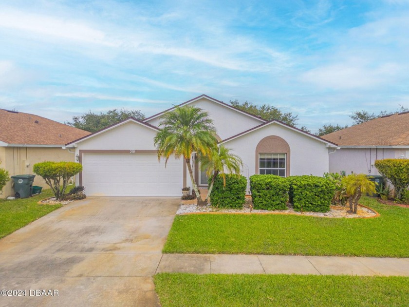 This beautifully maintained lakefront residence, built in 2005 - Beach Home for sale in Daytona Beach, Florida on Beachhouse.com