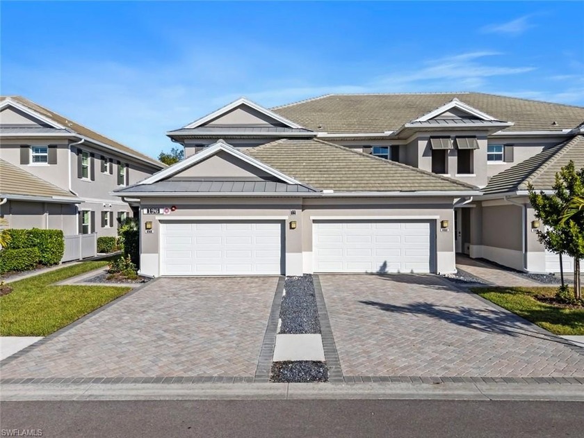 Experience the Grand Coach Home model, built in 2022, offering a - Beach Condo for sale in Naples, Florida on Beachhouse.com