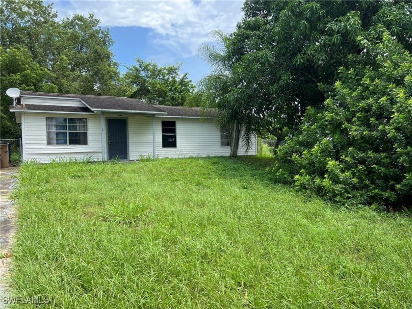 Oversized, Fenced, Fresh Water Canal Front Property In A Great - Beach Home for sale in Lehigh Acres, Florida on Beachhouse.com