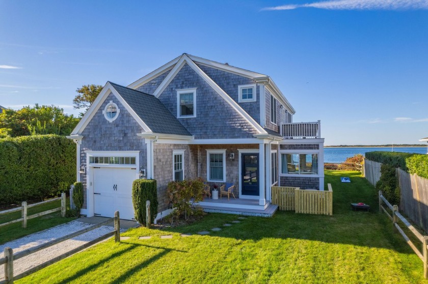 This absolutely pristine Nantucket inspired cape set high upon - Beach Home for sale in Barnstable, Massachusetts on Beachhouse.com