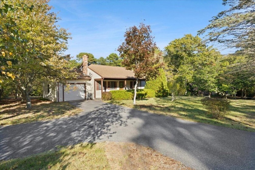 This charming single-story home features three bedrooms and two - Beach Home for sale in Bourne, Massachusetts on Beachhouse.com