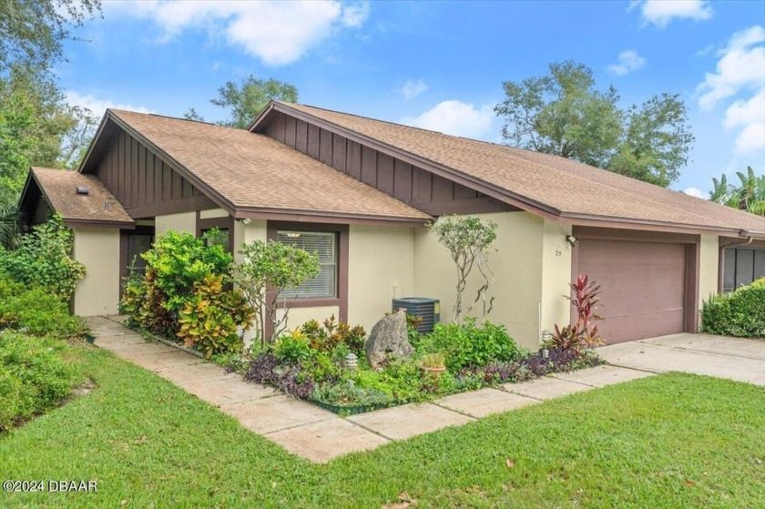 Nestled in the sought-after Trails subdivision at the end of a - Beach Home for sale in Ormond Beach, Florida on Beachhouse.com