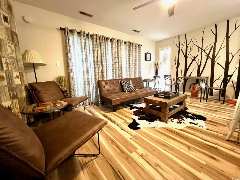 Updated 1st floor, end unit, in desirable Golf Colony!  This - Beach Condo for sale in Surfside Beach, South Carolina on Beachhouse.com