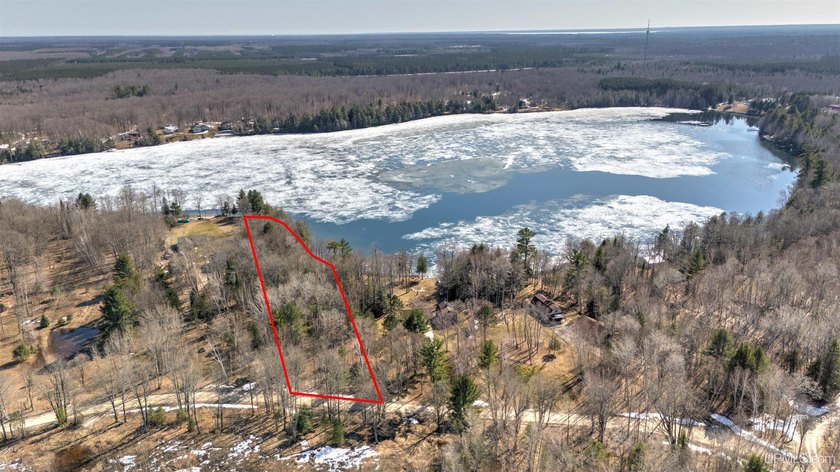 Sitting on the north side of Smith Lake in the heart of the - Beach Lot for sale in Manistique, Michigan on Beachhouse.com