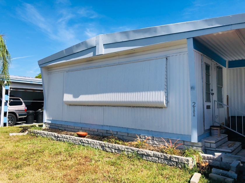 Roof transferable 5 years old   Water & trash included in lot - Beach Home for sale in Clearwater, Florida on Beachhouse.com