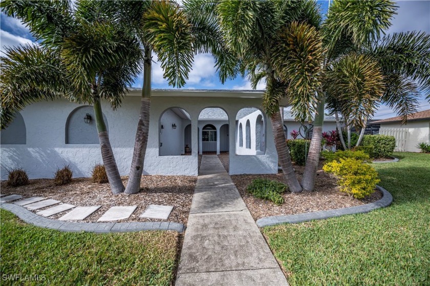 Welcome to this stunning, remodeled (2019) home situated on a - Beach Home for sale in Cape Coral, Florida on Beachhouse.com