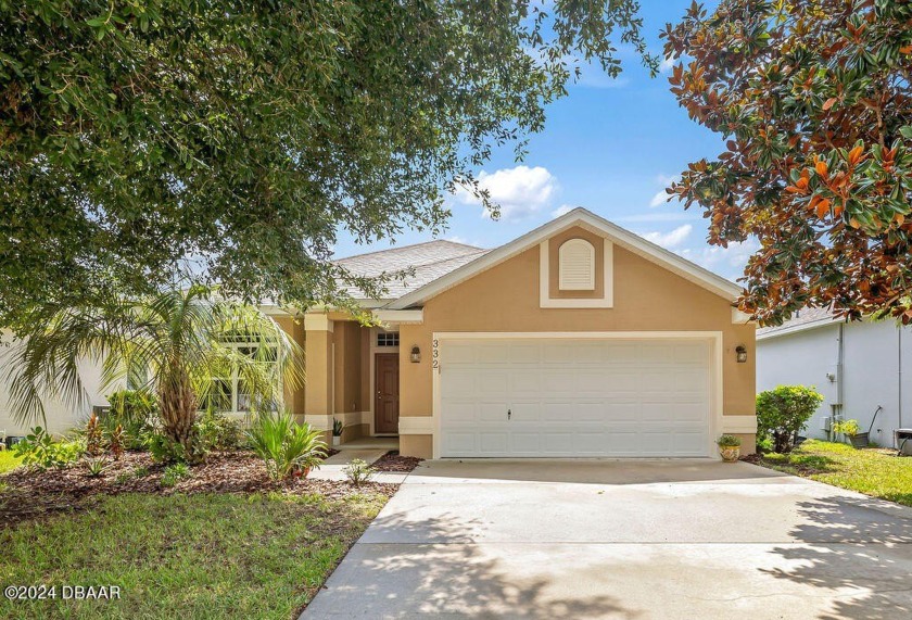 Welcome to the coveted subdivision of Edgewater Lakes! This - Beach Home for sale in Edgewater, Florida on Beachhouse.com