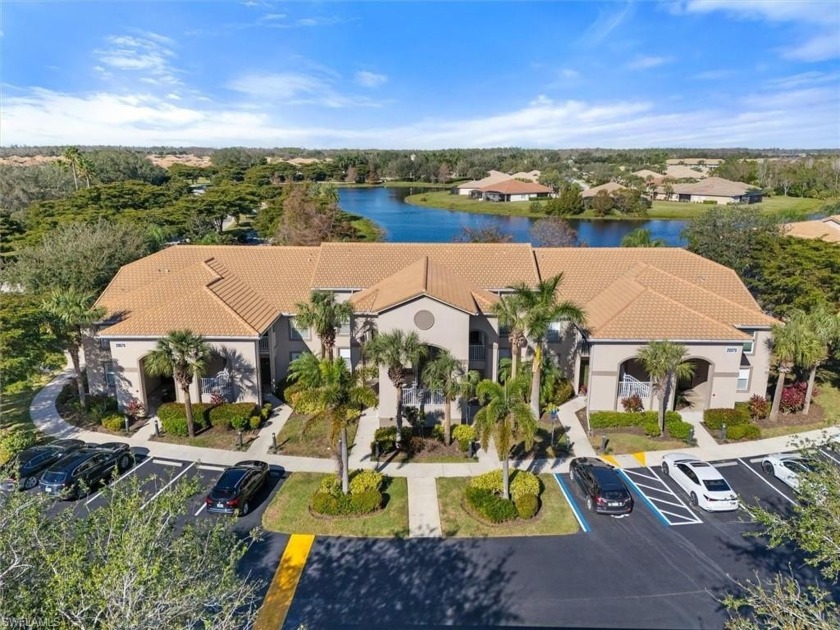 GORGEOUS MOVE-IN READY 1st FLOOR UNIT WITH STUNNING LAKE VIEWS! - Beach Home for sale in Estero, Florida on Beachhouse.com