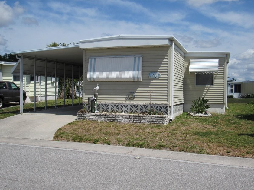 Welcome to Holiday Park, an active 55+, maintenance free, gated - Beach Home for sale in North Port, Florida on Beachhouse.com