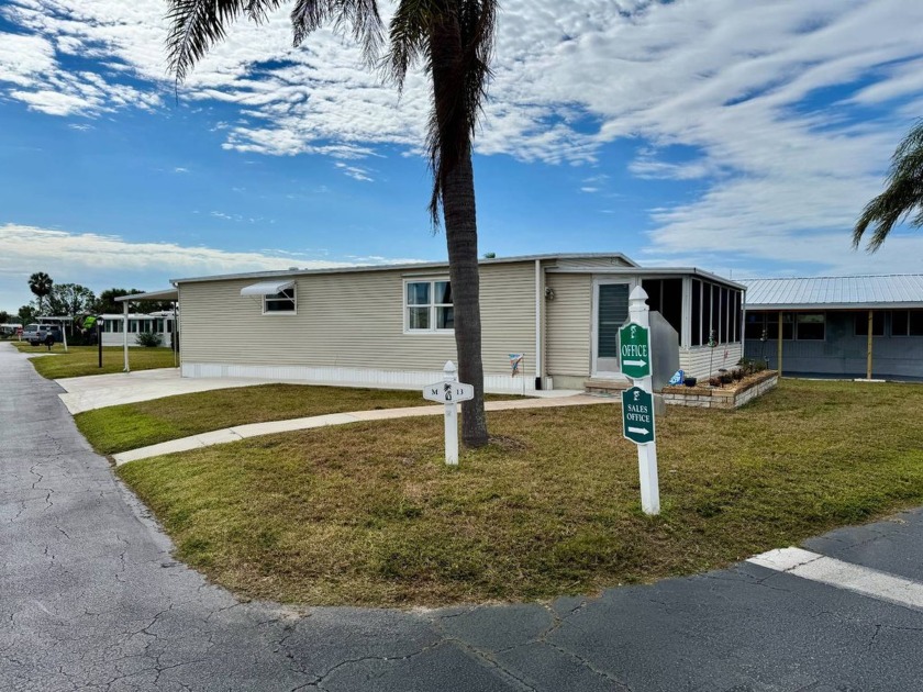 1974 double-wide updated home, offering a delightful blend of - Beach Home for sale in Bradenton, Florida on Beachhouse.com