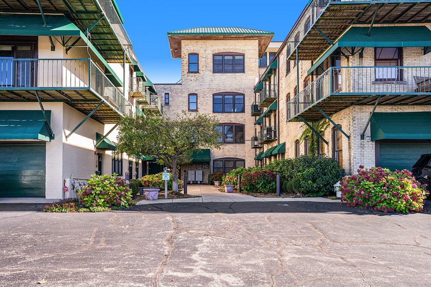 Experience downtown living at it's finest in this recently - Beach Condo for sale in Grand Haven, Michigan on Beachhouse.com