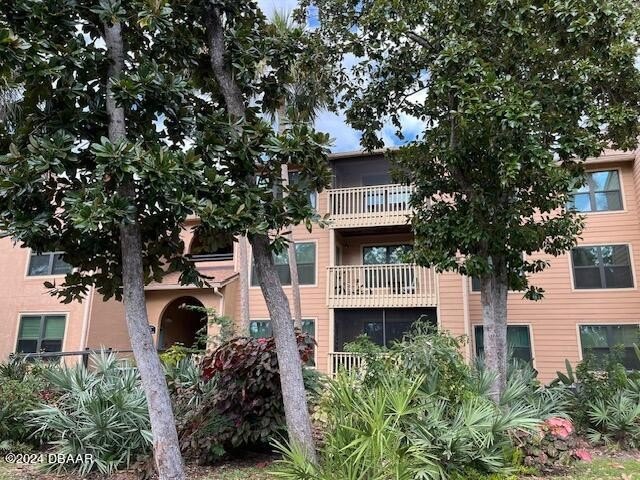 The Preserve at Rivers Edge - Lush landscaping welcomes you home - Beach Condo for sale in Daytona Beach, Florida on Beachhouse.com