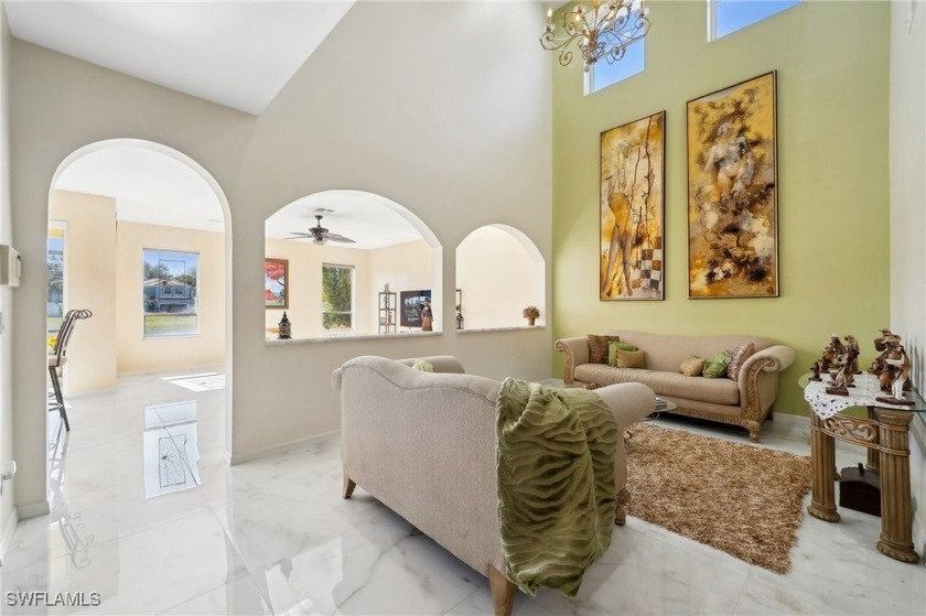 Welcome to this stunning 5-bedroom, 4-bathroom home, where - Beach Home for sale in Estero, Florida on Beachhouse.com