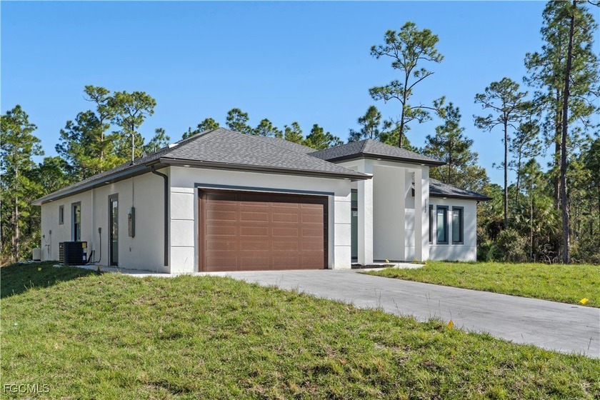 Beautiful brand-new construction located in Lehigh Acres. This - Beach Home for sale in Lehigh Acres, Florida on Beachhouse.com