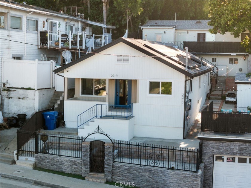 Views abound from this hillside beach bungalow duplex. Ideal for - Beach Townhome/Townhouse for sale in San Pedro, California on Beachhouse.com