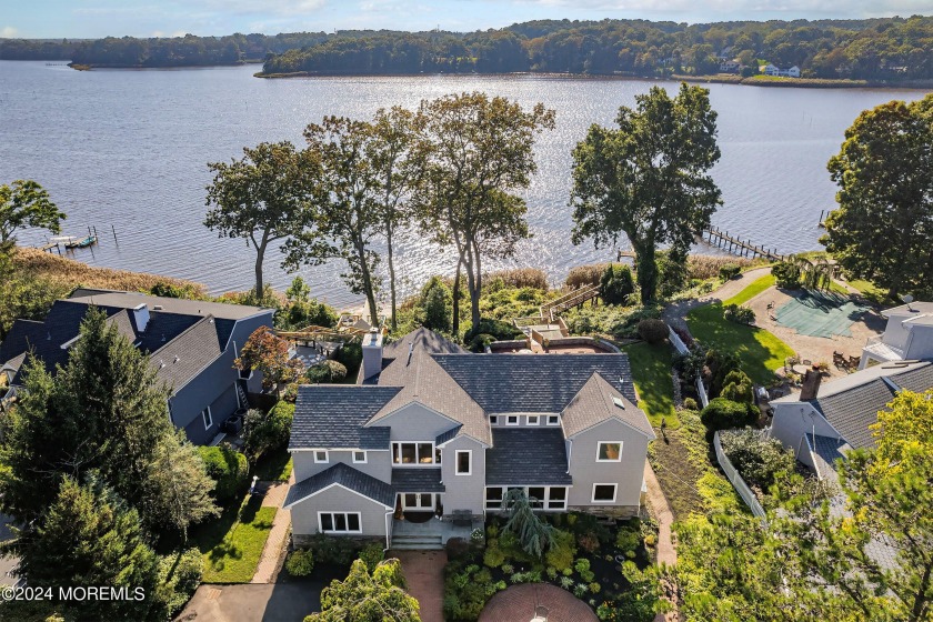 Discover unparalleled waterfront living in this breathtaking - Beach Home for sale in Manasquan, New Jersey on Beachhouse.com