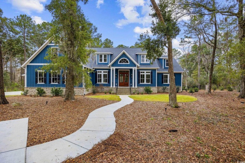 Welcome to this stunning 5-bedroom, 4.5-bath home in the heart - Beach Home for sale in Pawleys Island, South Carolina on Beachhouse.com