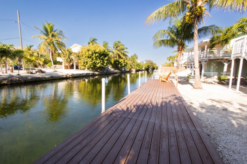 22526 La Fitte Drive, is coastal living at its finest. Nestled - Beach Condo for sale in Cudjoe Key, Florida on Beachhouse.com