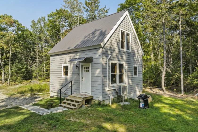 This newly built Sprucewold cottage awaits a new owner.  Tucked - Beach Home for sale in Boothbay Harbor, Maine on Beachhouse.com