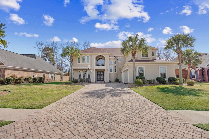 This exceptional five-bedroom, four-bath custom home with over 6 - Beach Home for sale in Myrtle Beach, South Carolina on Beachhouse.com