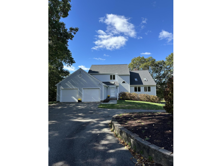 This contemporary home is located on a quiet circle with a - Beach Home for sale in Falmouth, Massachusetts on Beachhouse.com