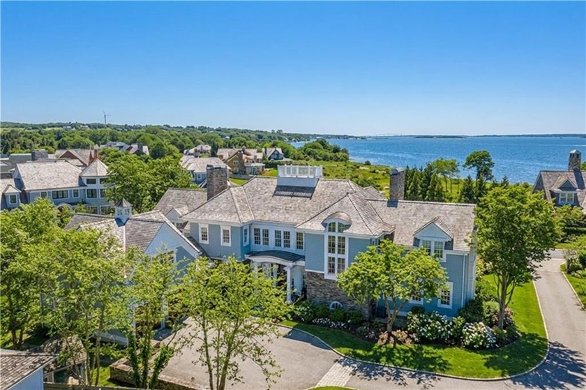 A gated, winding drive creates a sense of arrival, leading to a - Beach Home for sale in Portsmouth, Rhode Island on Beachhouse.com