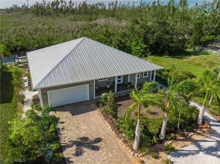 Embark on a journey to discover your waterfront haven within the - Beach Home for sale in Bokeelia, Florida on Beachhouse.com