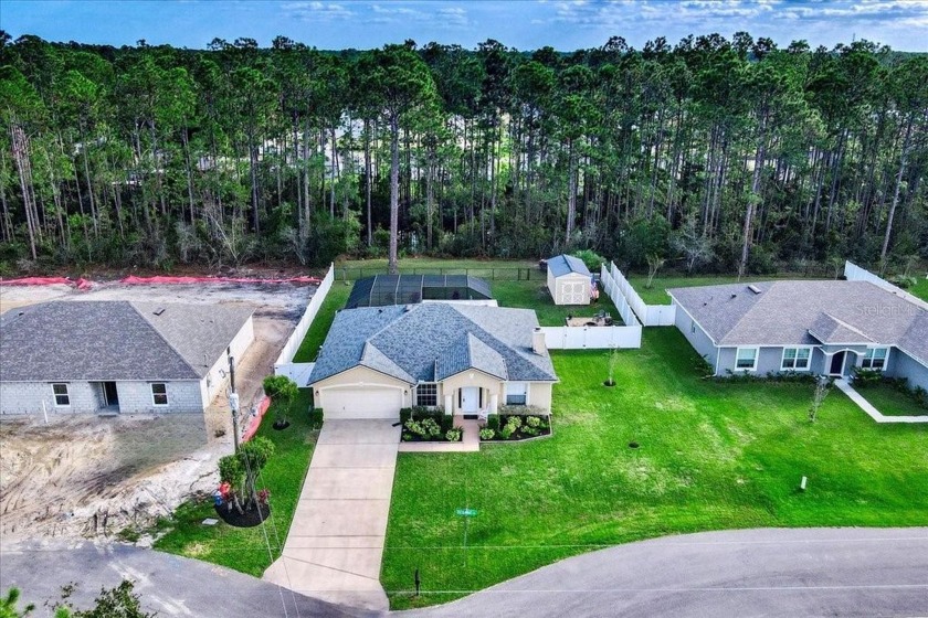 Prepare to be impressed by this stunning 3-bedroom, 2-bath pool - Beach Home for sale in Palm Coast, Florida on Beachhouse.com