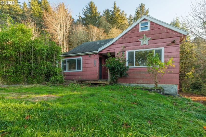 With serene Columbia River views and a peaceful, private - Beach Home for sale in Astoria, Oregon on Beachhouse.com