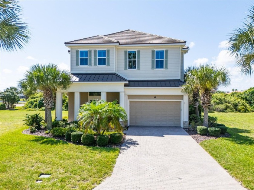 Nestled just steps from the Atlantic Ocean, this stunning - Beach Home for sale in Palm Coast, Florida on Beachhouse.com