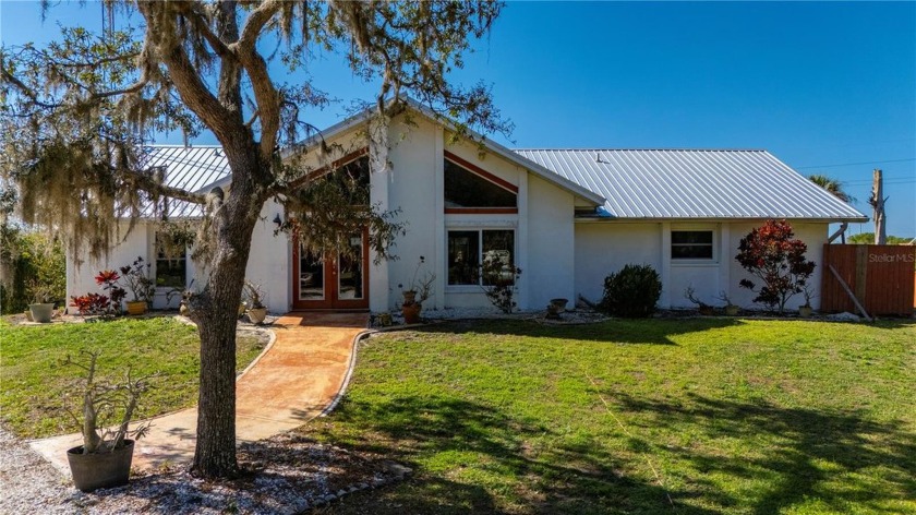 Escape to your own private, nature retreat nestled on over 8 - Beach Home for sale in Punta Gorda, Florida on Beachhouse.com