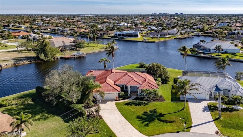 Exceptional Custom Waterfront Home on Prime Corner Lot - Beach Home for sale in Cape Coral, Florida on Beachhouse.com