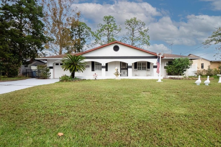 This inviting Indian Trails home features an open-concept design - Beach Home for sale in Palm Coast, Florida on Beachhouse.com