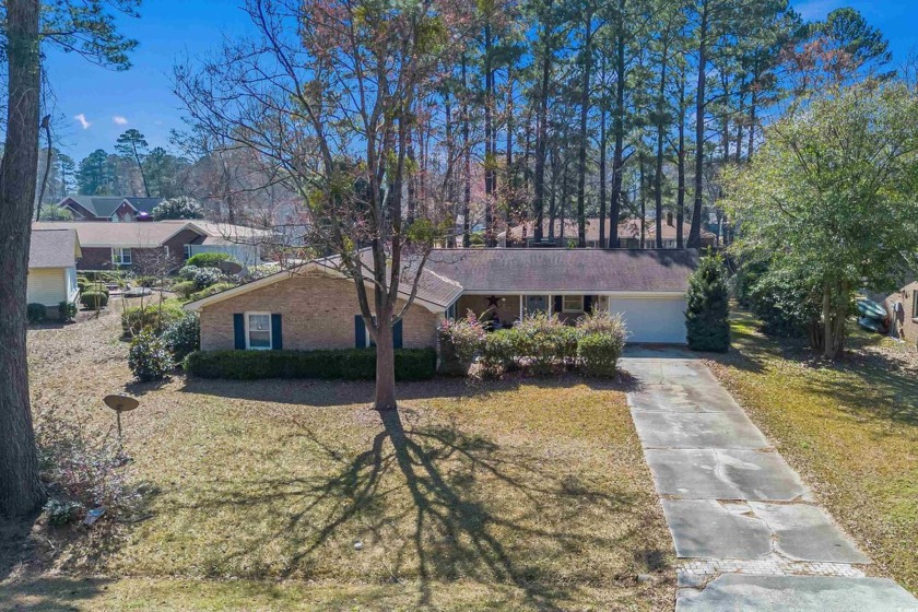 Charming Brick Home on a Stunning Lakefront Lot in Deerfield - Beach Home for sale in Surfside Beach, South Carolina on Beachhouse.com