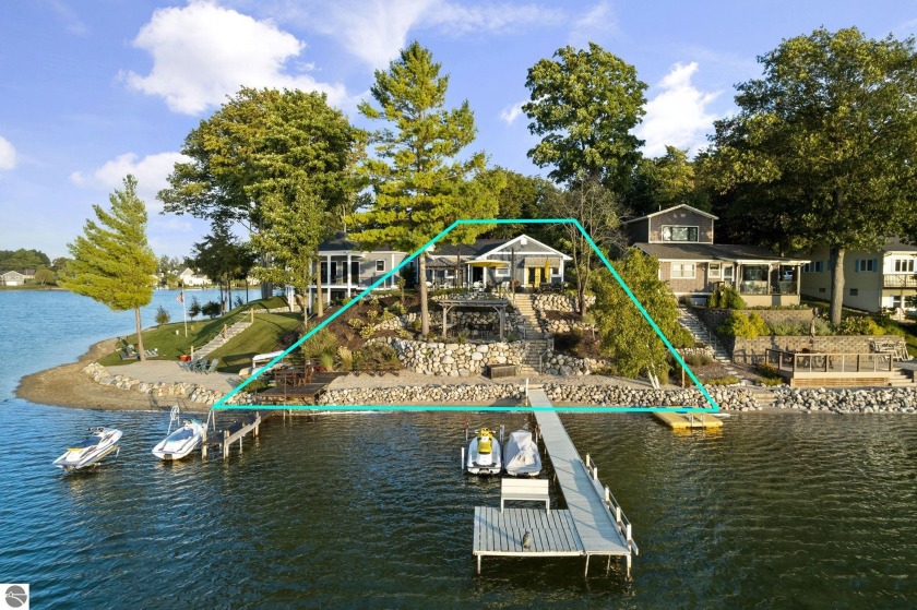 Prepare to be blown away by this gem of a home with 85 ft. of - Beach Lot for sale in Traverse City, Michigan on Beachhouse.com