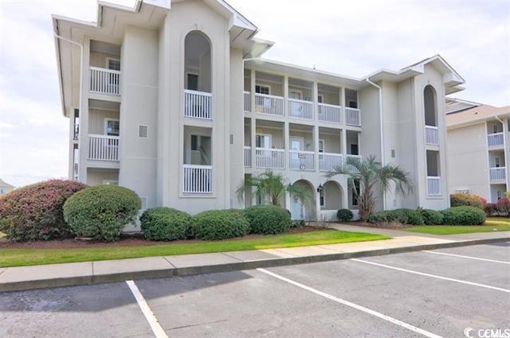 This 2-bedroom, 2-bathroom corner unit in Spinnaker Cove offers - Beach Condo for sale in Little River, South Carolina on Beachhouse.com